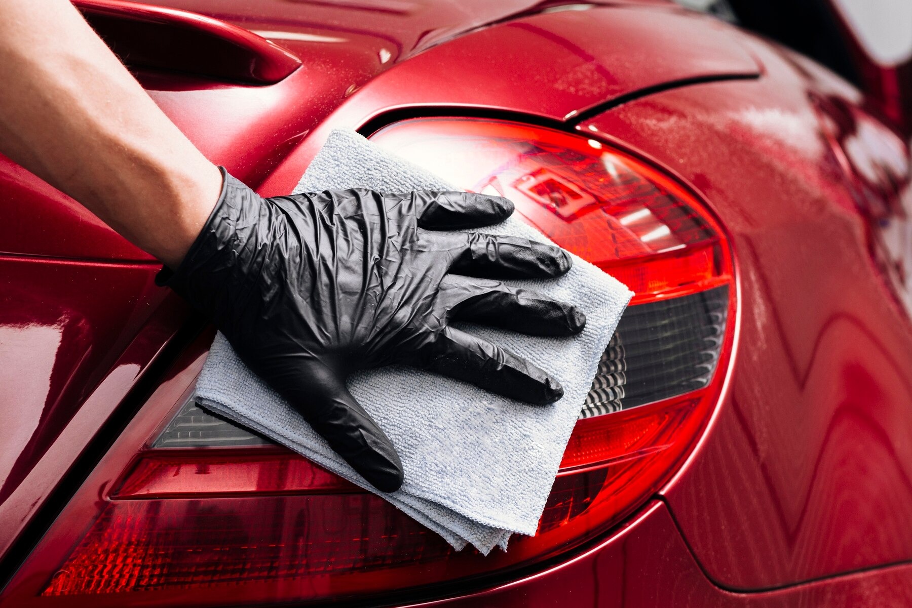 Careful hand cleaning of a car